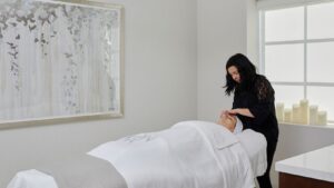 a woman getting a massage at Cavana Ridge.