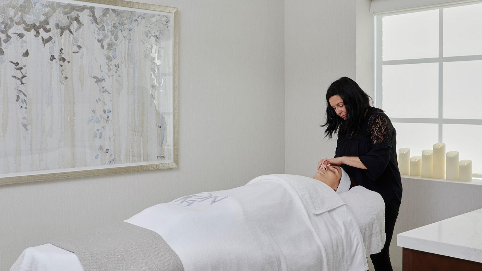 a woman getting a massage at Cavana Ridge.